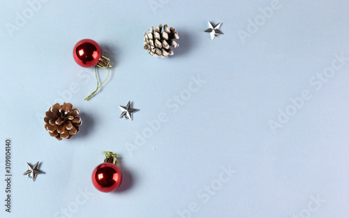 Christmas and happy new year concept. Pine cons, stars, balls