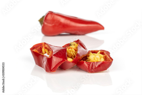 Group of one whole three slices of pickled red pepper isolated on white background