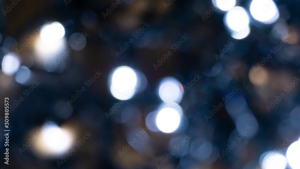 Abstract light, bokeh effect, new year lights. Dark background, bokeh light. Abstract light, bokeh effect, new year lights. Dark background, bokeh light.