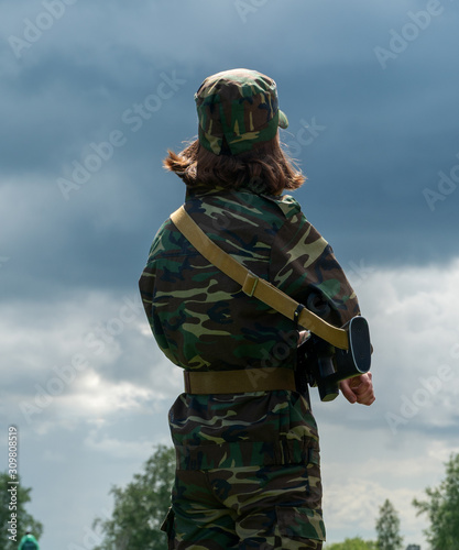 A woman in uniform with a rifle in the army unit patrolling the border area. © Nick Vakhrushev