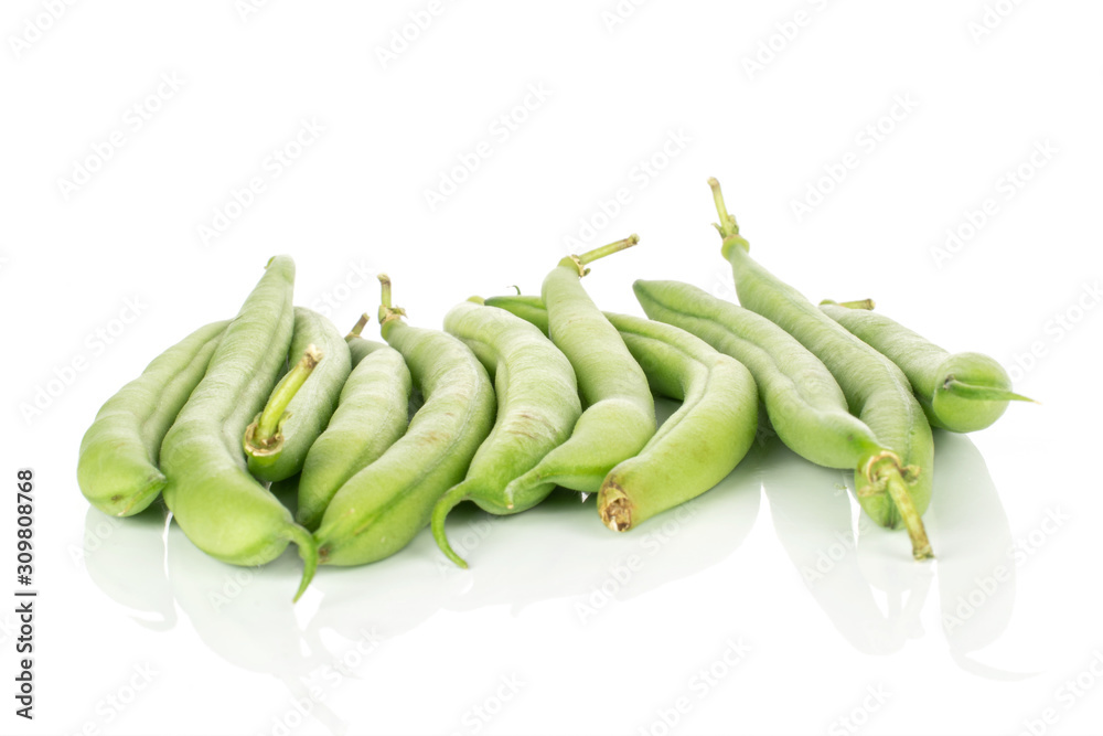 Lot of whole snap green bean pods isolated on white background