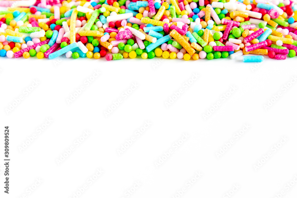 Sugar sprinkles dots on white background, decoration for cake and bakery for happy easter. Isolated on white. Sugar sprinkles dots on white background, decoration for cake and bakery for happy easter. Isolated on white.