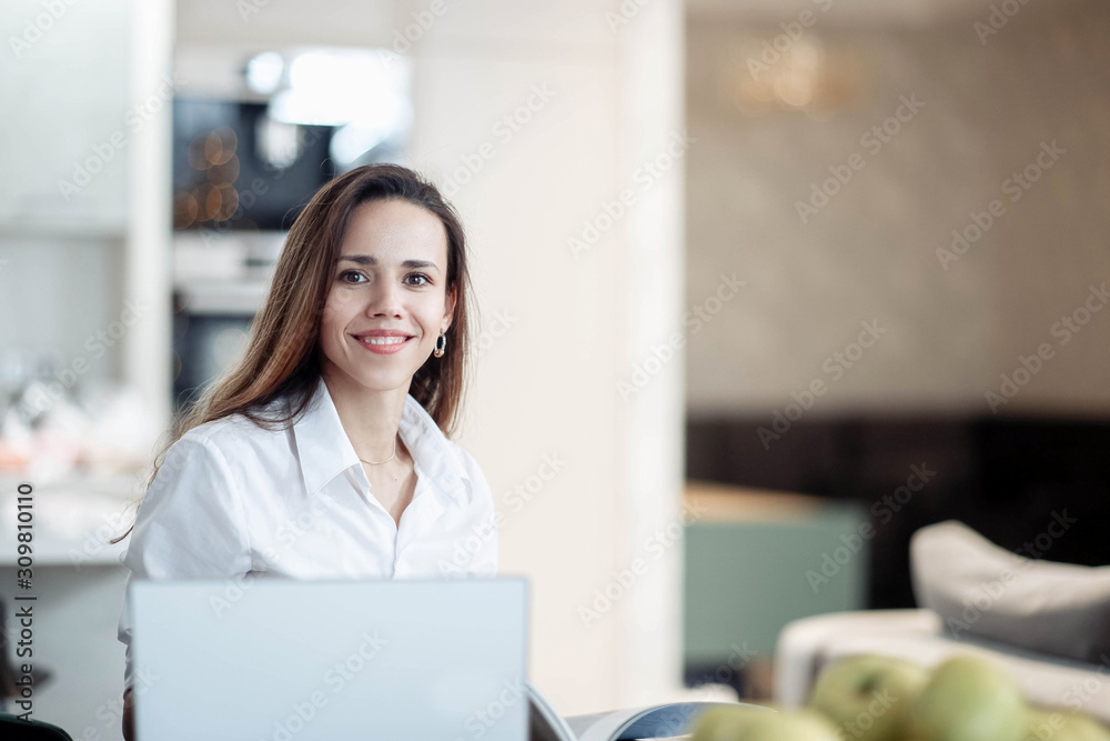 Woman business worker in modern bright coworking office working with laptop, interior designer. Woman business worker in modern bright coworking office working with laptop, interior designer.