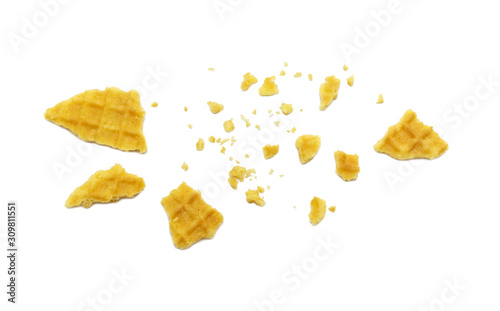 Crumbs of waffle crisp butter flavor biscuits isolated on white background.