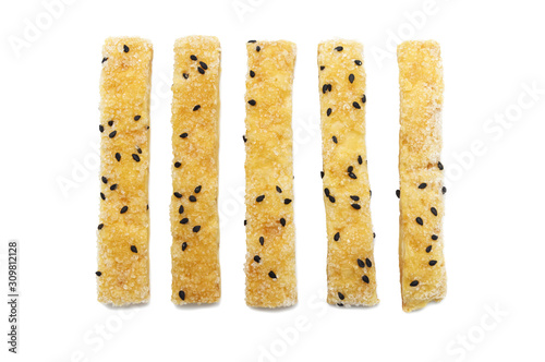 Pie or Bread stick with black sesame isolated on white background.