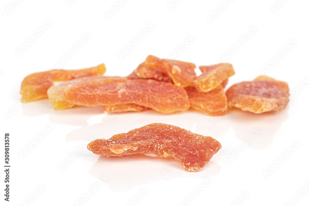 Lot of whole dried orange papaya piece front focus isolated on white background Lot of whole dried orange papaya piece front focus isolated on white background
