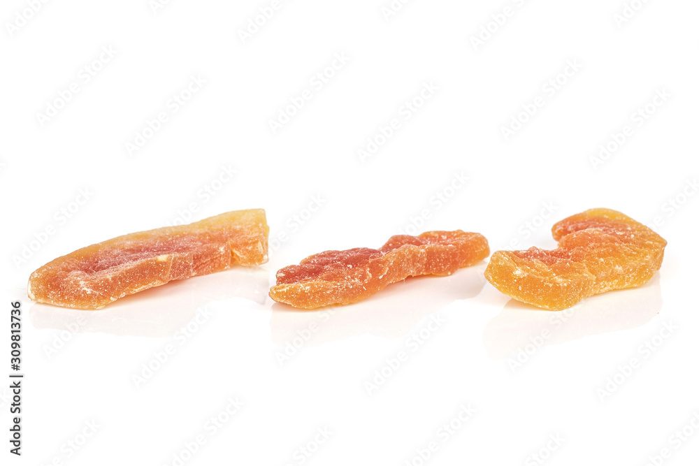 Group of three whole dried orange papaya piece isolated on white background Group of three whole dried orange papaya piece isolated on white background