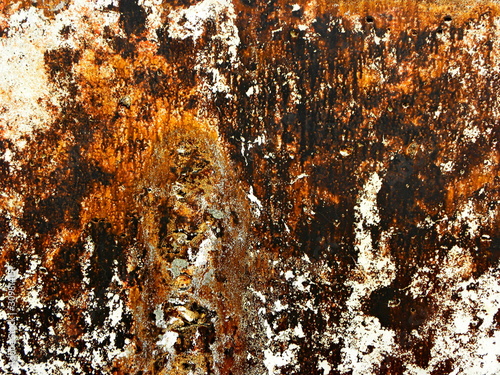 wall with traces of paint and rust