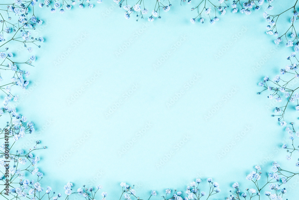 Beautiful flower frame of blue gypsophila flowers. Flat lay, top view. Floral pattern. Beautiful flower frame of blue gypsophila flowers. Flat lay, top view. Floral pattern.