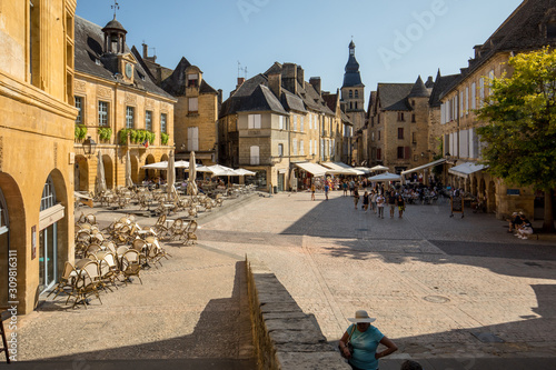 Fototapeta Naklejka Na Ścianę i Meble -   Historic houses surrounding Place de la Liberte in Sarlat la Caneda in Dordogne Department, Aquitaine, France