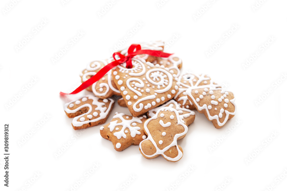 Xmas gingerbread cookies isolated on a white background. Christmas, New Year, winter concept. Christmas sweet composition. Flat lay, top view, copy space Xmas gingerbread cookies isolated on a white background. Christmas, New Year, winter concept. Christmas sweet composition. Flat lay, top view, copy space