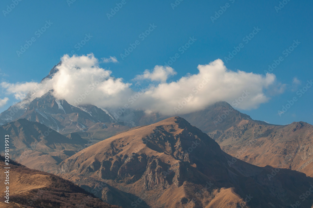 Amazing beautiful mountains landscape in clouds. Travel views of nature