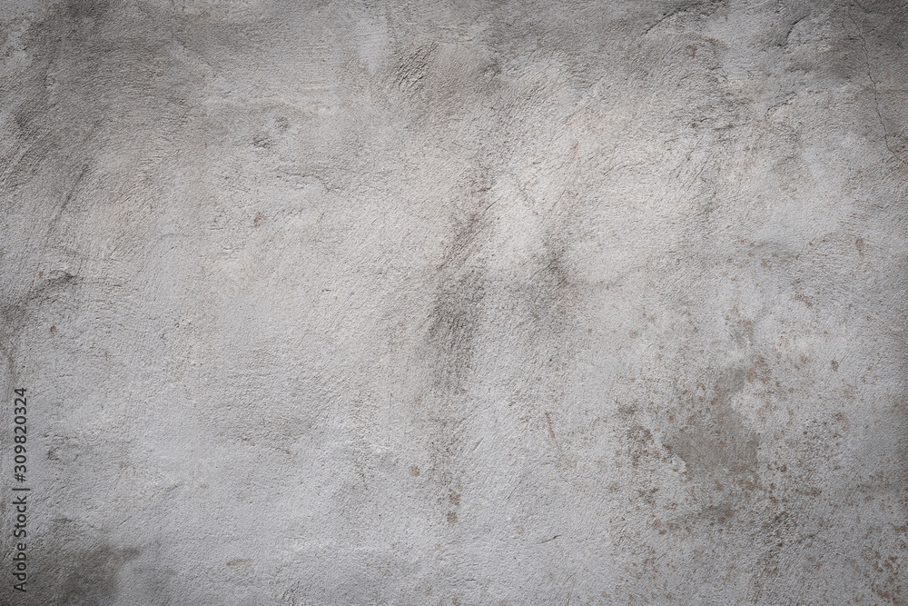 Gray concrete wall texture painted with white. The old white color that has been fading and peeling off. Texture of old dirty concrete wall for background. Gray concrete wall texture painted with white. The old white color that has been fading and peeling off. Texture of old dirty concrete wall for background.