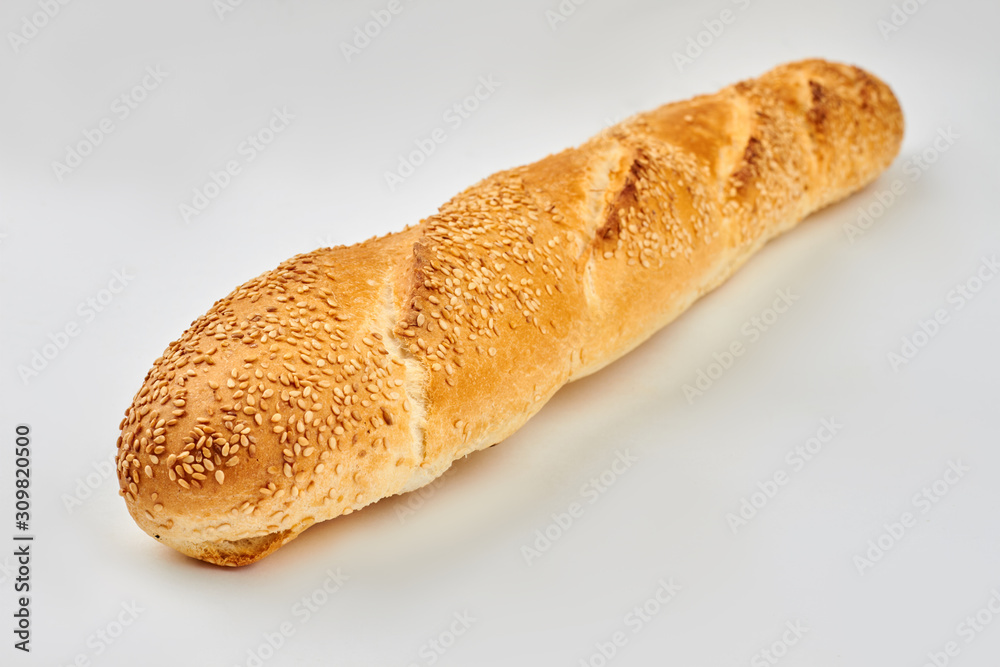 French baguette isolated on white background. Fresh loaf of french bread. Space for text.