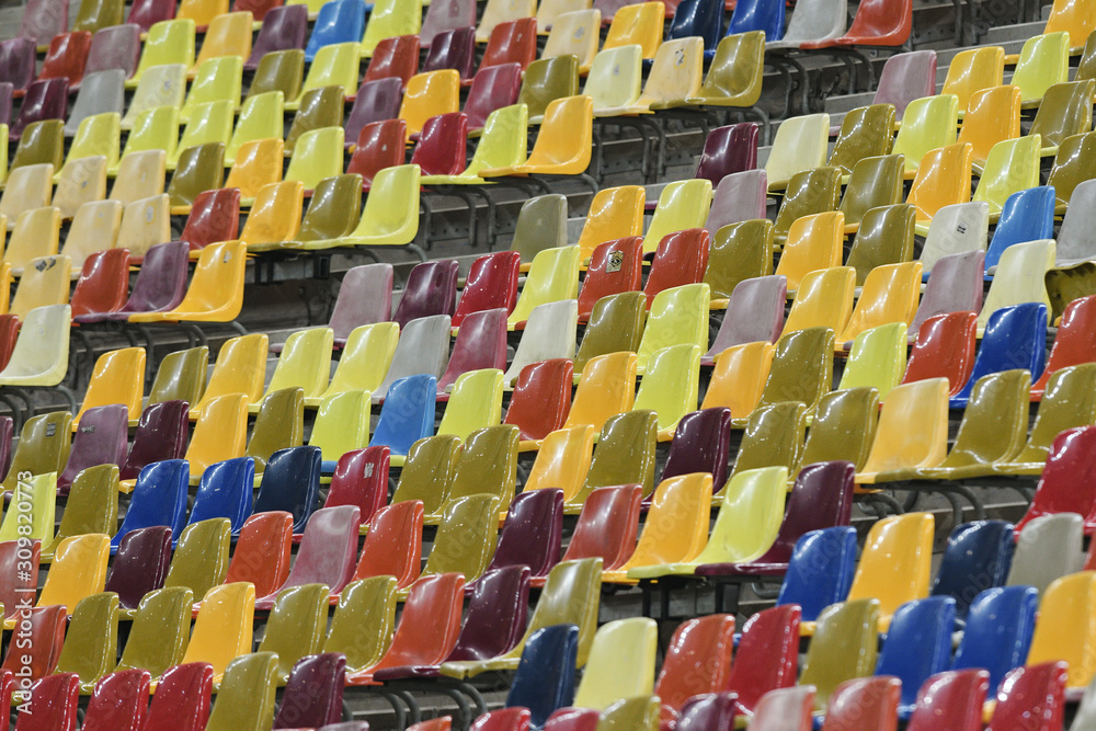 Empty colorful seats at the stadium