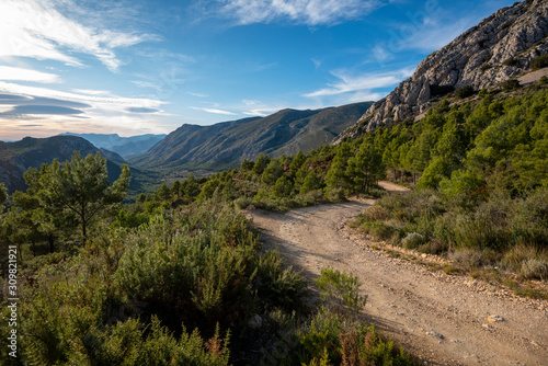 Empty dirt road on sandstone, Barranc de l'Arc, Sella, Alicante province, Costa Blanca, Spain