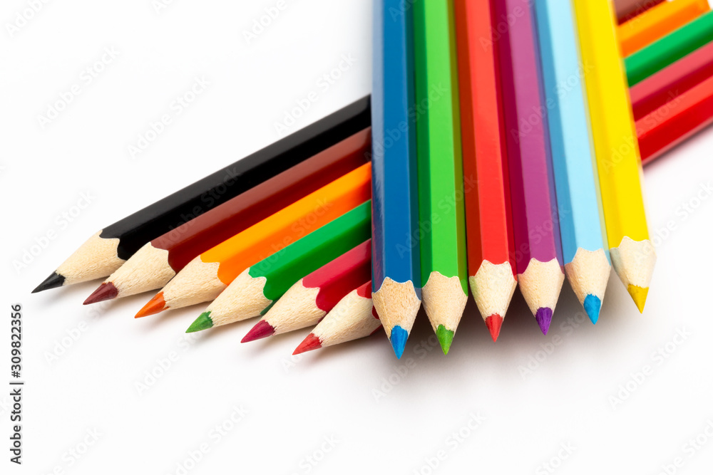 Naklejka premium Colorful color wooden pencils on a white background