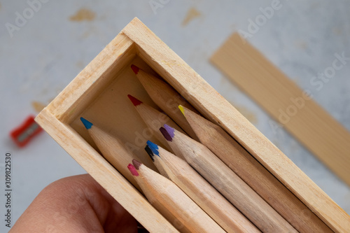wooden pencil case with colour pencils for back to school