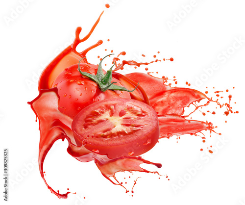 tomatoes in red juice splash isolated on a white background photo