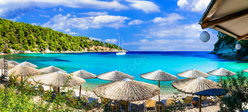 Fototapeta Naklejka Na Ścianę i Meble -  Alonissos island - beautiful organized beach Milia with turquoise waters, Sporades,Greece