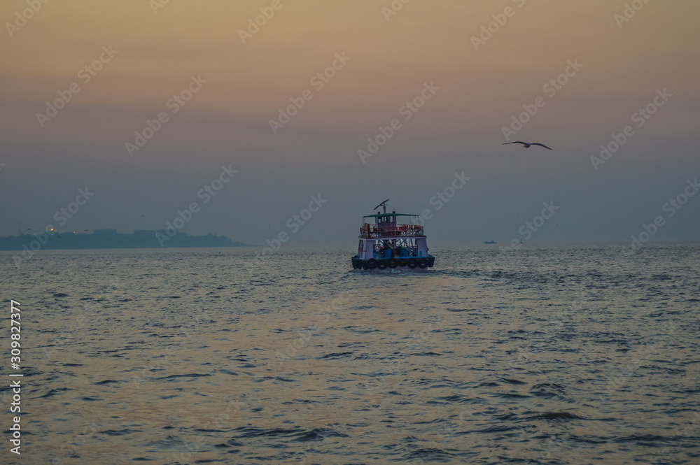 A beautiful seascape in Arabian sea while on a boat trip to Elephanta caves from Gateway of India