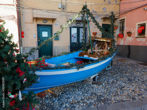 Small boat used for Christmas celebration in Genova Boccadasse © PacketStockPhoto