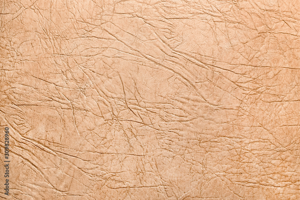 Texture of leather cracked upholstery sofa beige color Texture of leather cracked upholstery sofa beige color