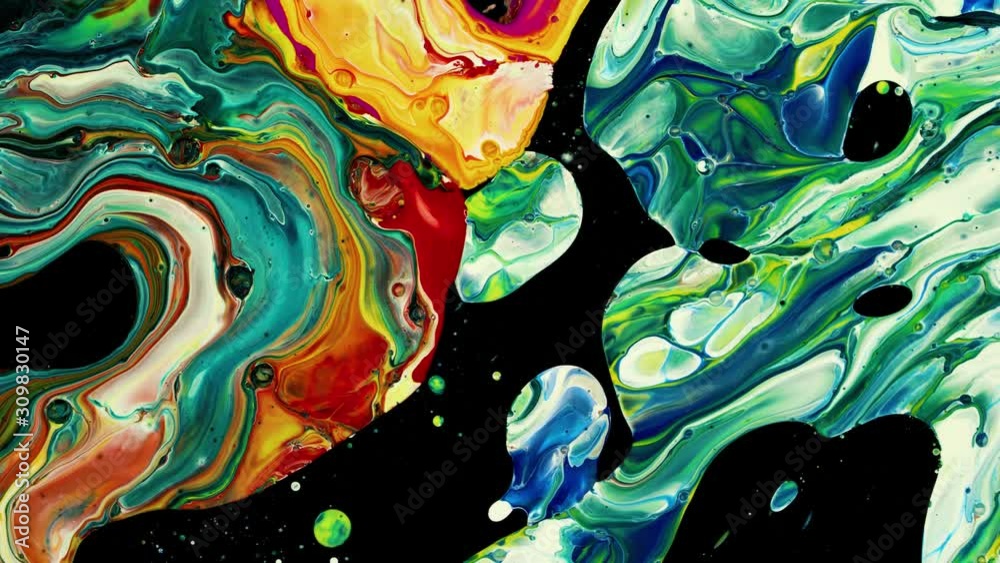 Slow motion relaxing view background.  Vibrant multi color thick liquid flow.