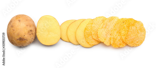 Tasty chips with raw potato on white background