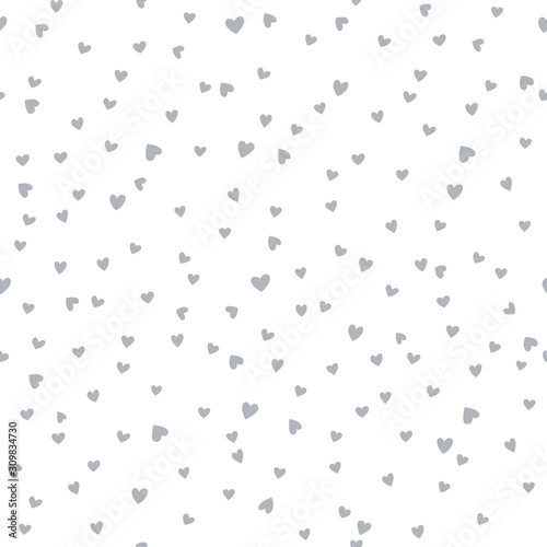 Vector seamless pattern with little hearts. Creative scandinavian childish background for Valentine's Day. Monochrome neutral hearty backdrop for wrapping paper, textile, fabric, card making.