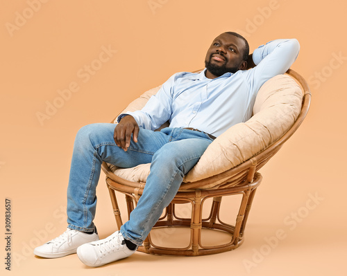 African-American man relaxi...
