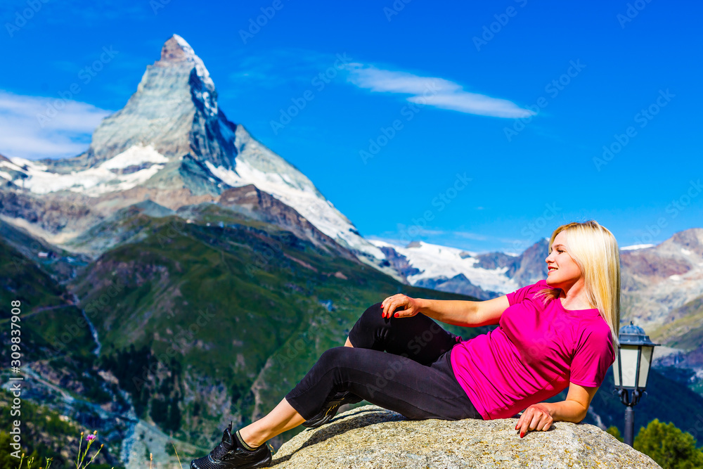 Sports girl on a background of mountains