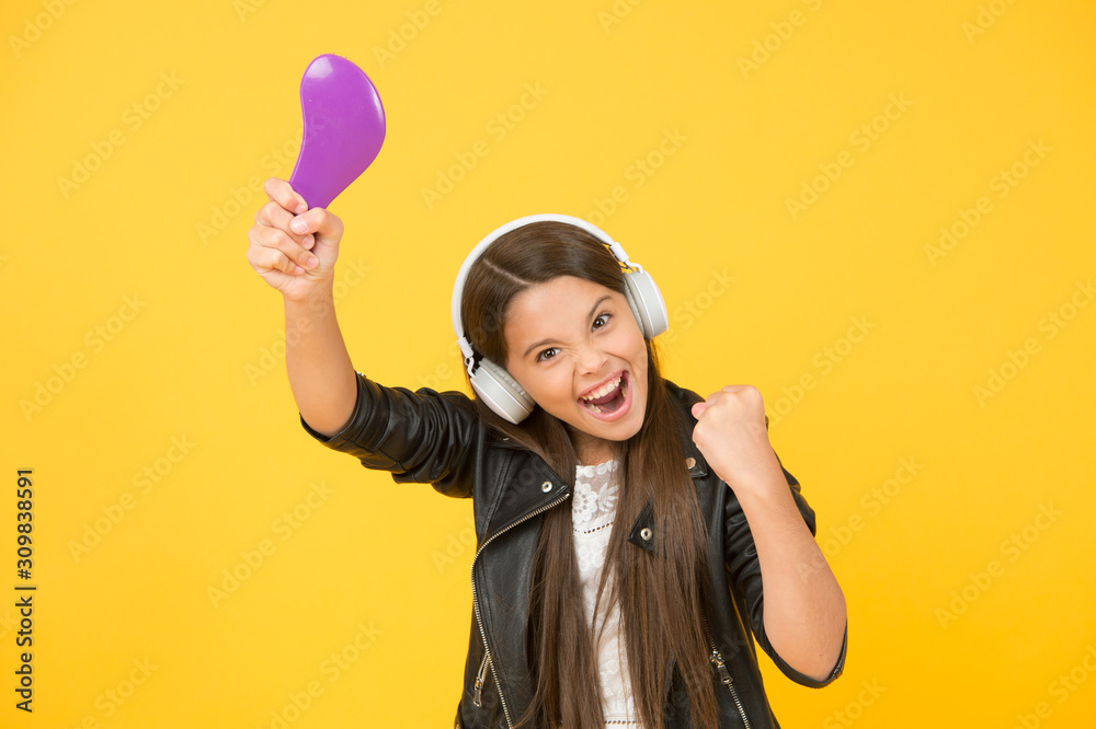 Dance to the rhythm. hipster urban style girl. kid in headset. small girl sing favorite song. imagine you pop star. singing karaoke. singer leather jacket. child listen rock music. school radio dj Dance to the rhythm. hipster urban style girl. kid in headset. small girl sing favorite song. imagine you pop star. singing karaoke. singer leather jacket. child listen rock music. school radio dj