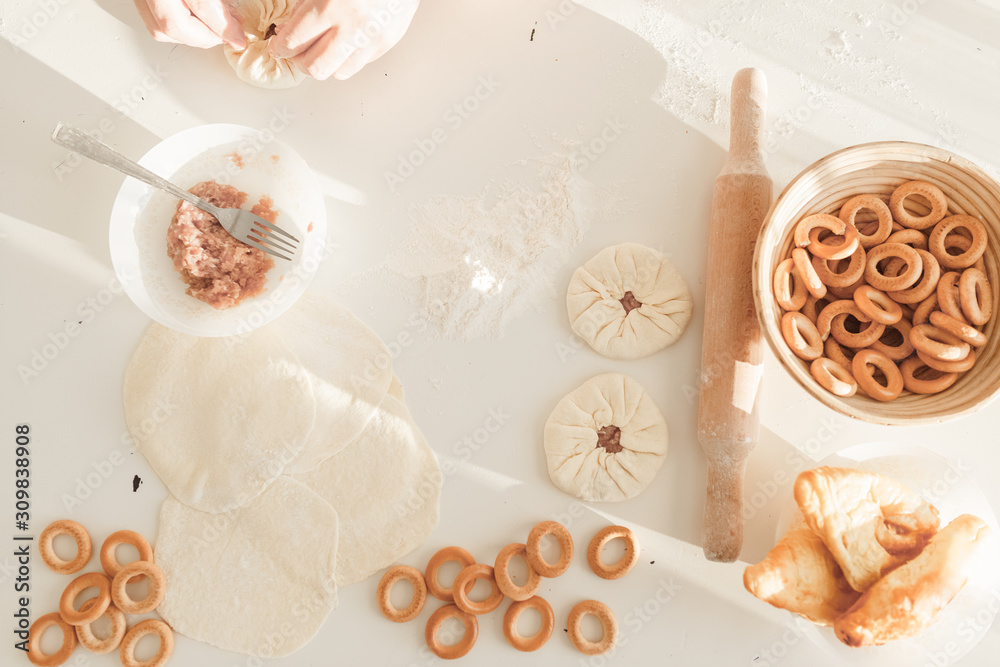 cooking traditional national dish, yeast dough, flour, women hands cooking traditional national dish, yeast dough, flour, women hands