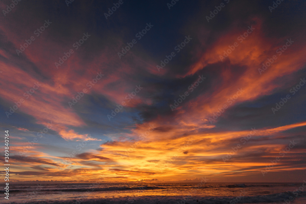 Beautiful sunset on the ocean. Color of the sky