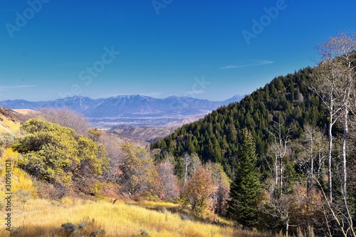 Rocky Mountain Wasatch Front peaks  panorama landscape view from Butterfield canyon Oquirrh range by Rio Tinto Bingham Copper Mine  Great Salt Lake Valley in fall. Utah  United States.