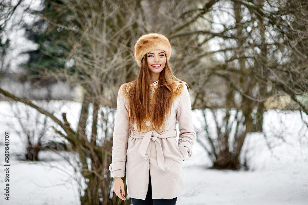 Gorgeous beautiful russian woman in winter park Gorgeous beautiful russian woman in winter park