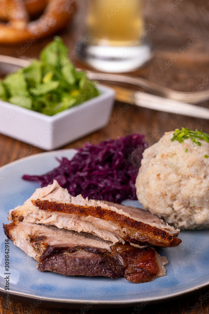 sliced bavarian roasted pork with dumpling