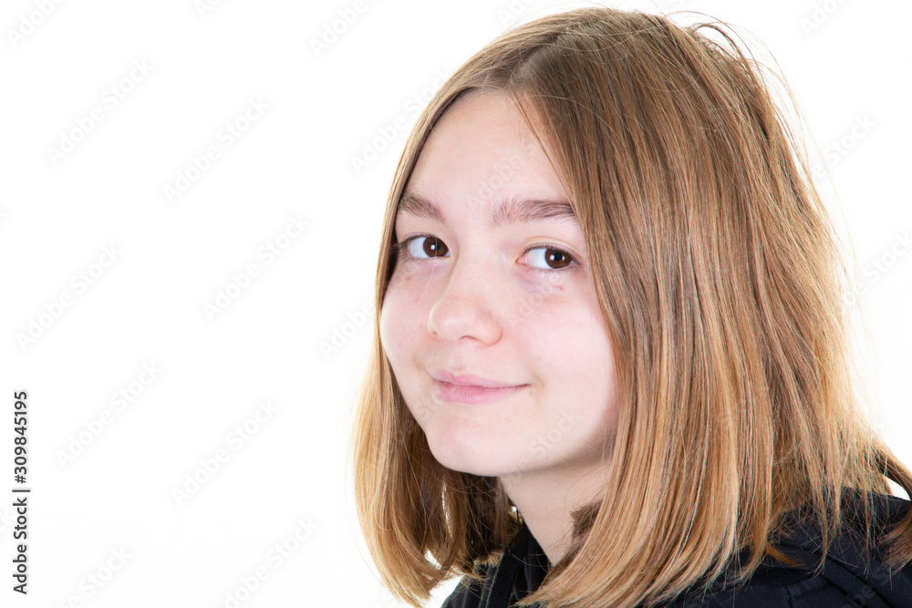 Portrait of cute teenage girl smiling on white background Portrait of cute teenage girl smiling on white background