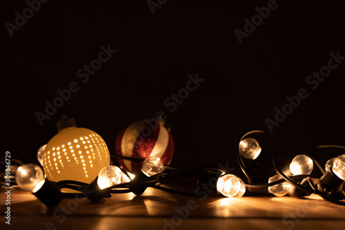 Border of defocused Christmas, lights on background.
