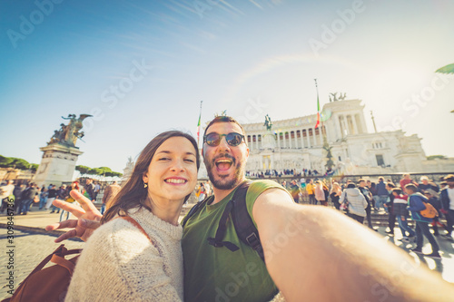happy handsome tourist couple taking selfie in Rome, capital of Italy