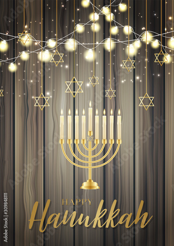 Happy Hanukkah. Traditional Jewish holiday. Chankkah banner, poster or flyer design concept, blue background. Judaic religion decor with Menorah, candles, golden lettering, wooden board. 