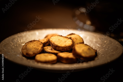 Tea cups with thin cream wafers. Teas with hot smoke. Fine cookies with accompanying special teas.