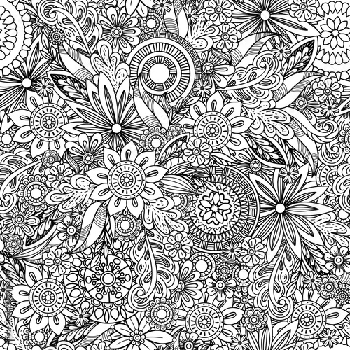 Hand drawn seamless pattern with leaves and flowers. Doodles floral ornament. Black and white decorative elements. Perfect for wallpaper, adult coloring books, web page background, surface textures.