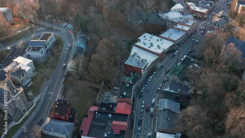 Aerial drone footage of Old Ellicott City, Maryland taken during the winter at sunset photo