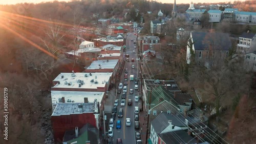 Aerial drone footage of Old Ellicott City, Maryland taken during the winter at sunset