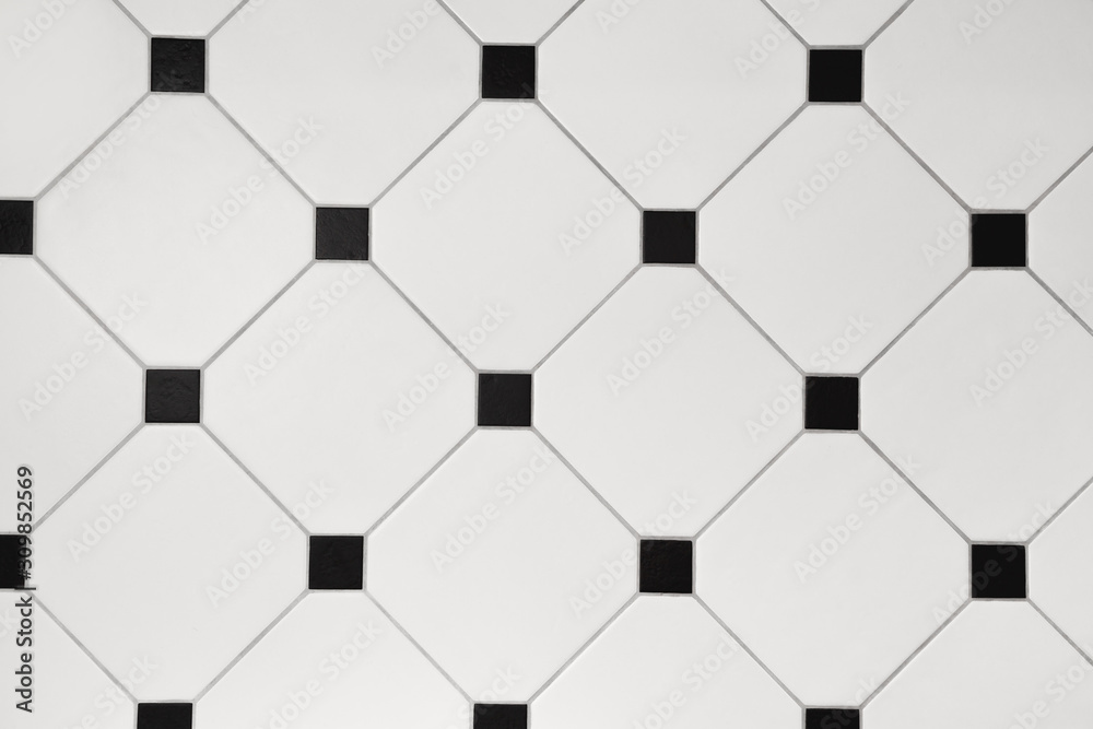 Ceramic white octagon with tessellation black tiles background
