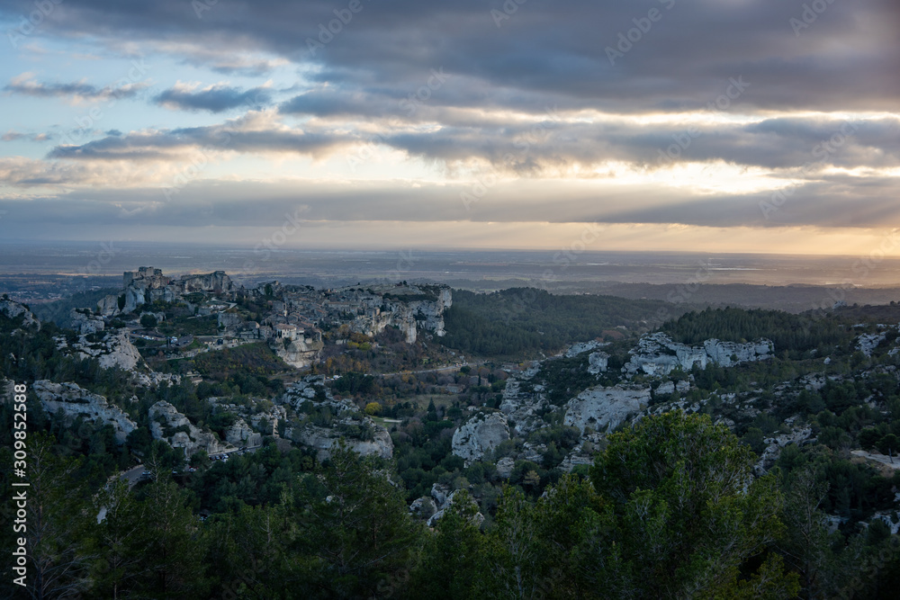 Fototapeta premium View of the Baux de Provence at sunset from a vantage point in the Alpilles at sunset, south of France.