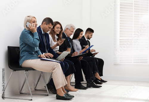 People waiting for job interview in office