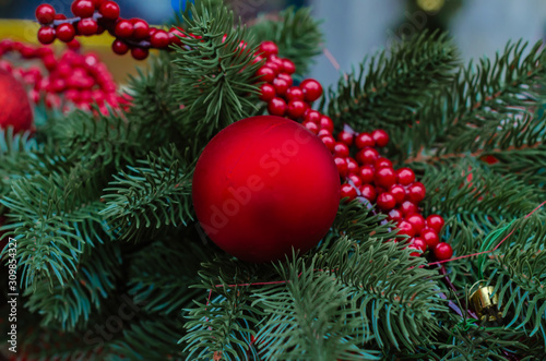 beautiful holiday tinsel for Christmas or New Year background with green fir